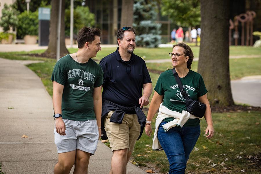 A family walks the Northwest campus during the University's 2023 Family Weekend. (Photo by Lauren Adams/Northwest Missouri State University)